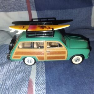 1949 Ford Woody Wagon With Surfboard
